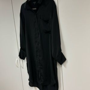 Topshop black polyester but feels like silk dress.  Tag says size 4.